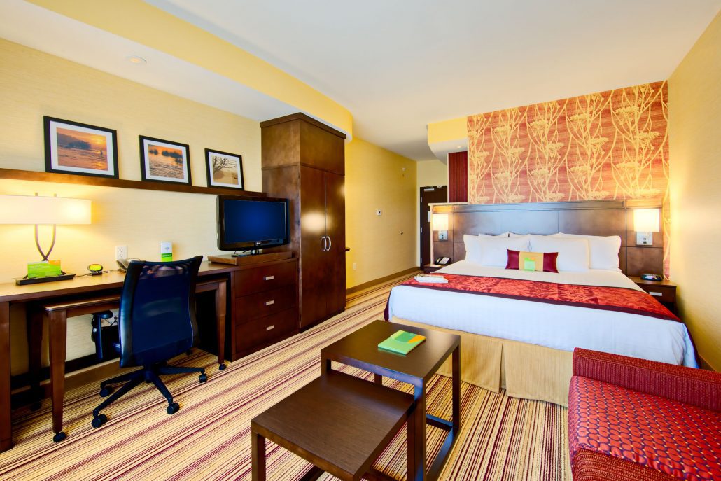 Courtyard by Marriott hotel room with queen size bed