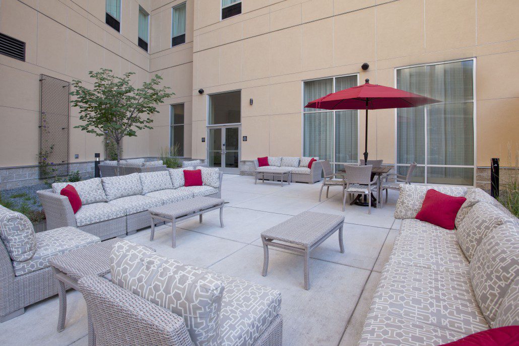 Hampton Inn & Suites outdoor patio area with seating