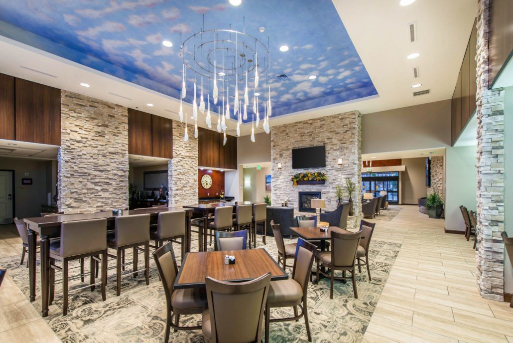 Heritage Inn & Suites dining area with high top tables