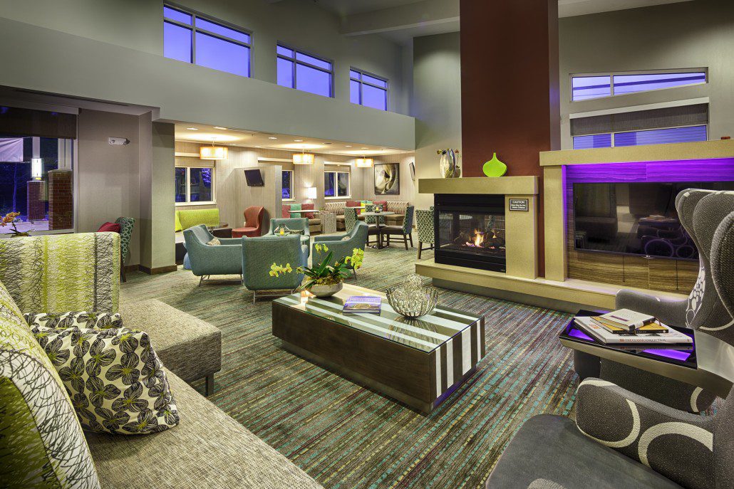 Residence Inn by Marriott lounge area with seating and fireplace