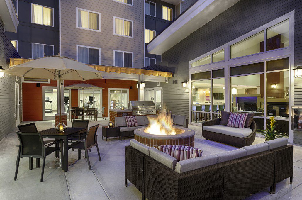 Residence Inn by Marriott outdoor patio with seating, barbecue grill and fire pit