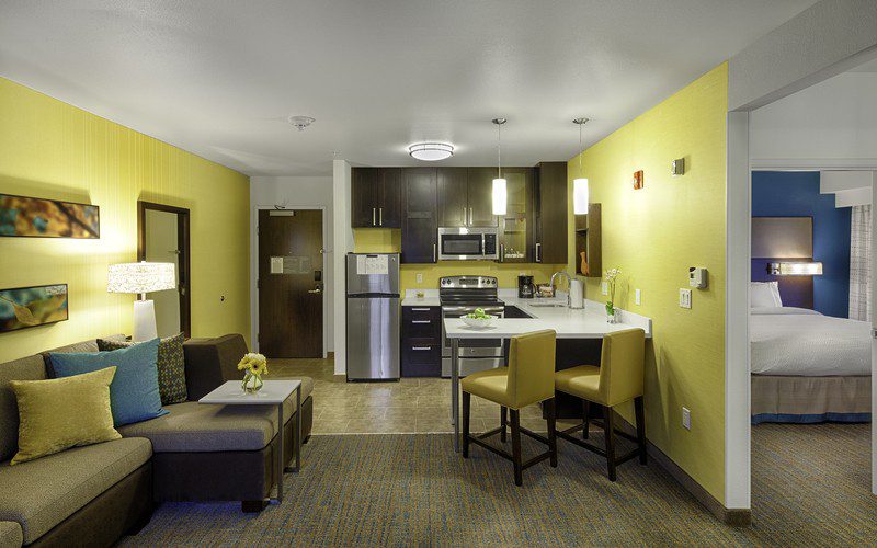 Residence Inn by Marriott large room with a bed, kitchenette and sofa