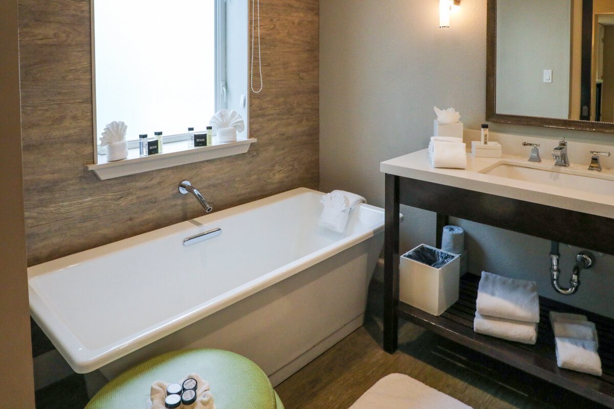 Almond Tree Inn hotel bathroom with tub and sink