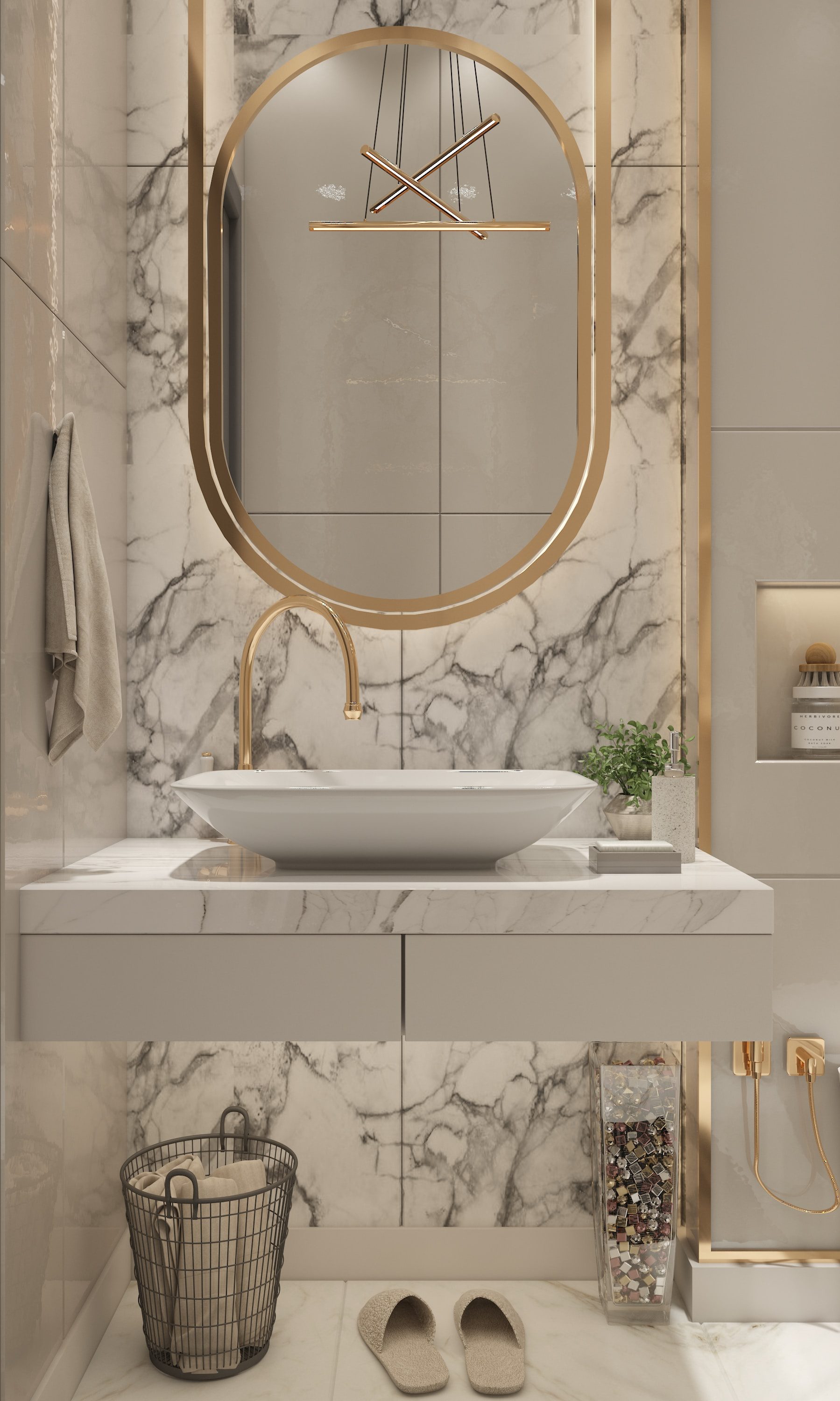 Bathroom vanity with marble backsplash and gold mirror