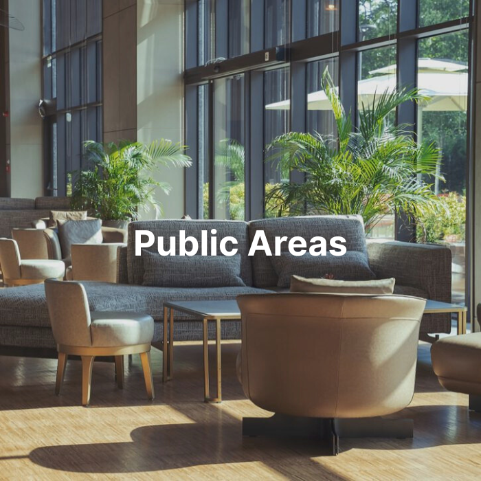 Modern hotel lobby seating and décor. Inviting hotel public areas featuring FF&E solutions like seating, lighting, and artwork that enhance first impressions.